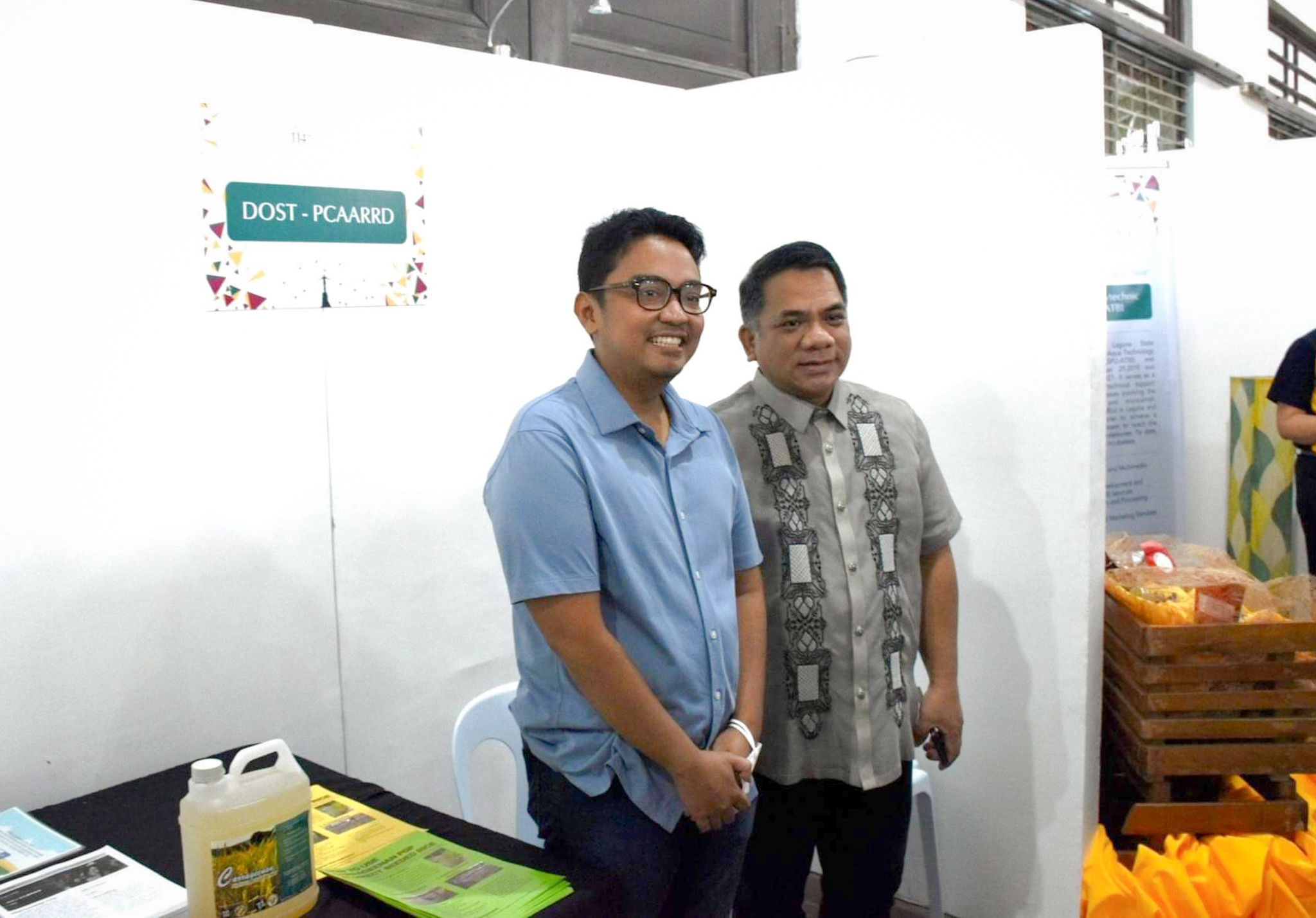 At the DOST-PCAARRD booth: Dr. Emil John C. Cabrera, Director, Technology Transfer and Business Development Office-UPLB (left) and UPLB Chancellor Jose V. Camacho. (Image credit: TIPS, DOST-PCAARRD)