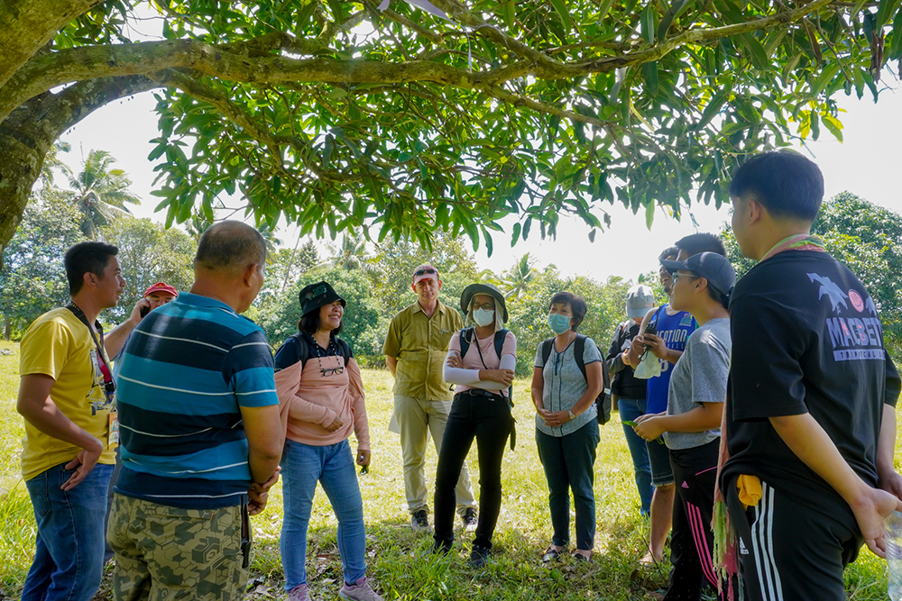 Key representatives from ACIAR, DOST-PCAARRD, UPMin, UPLB, and PAGRO Davao del Norte with farmer cooperators in Samal Island. (Image Credit: Crops Research Division, DOST-PCAARRD)