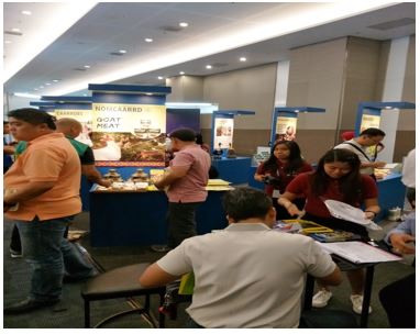 Staff members of DOST-PCAARRD Mindanao-based consortia attend to the needs of exhibit viewers during the Davao Agri Trade Expo at SMX Convention Center, SM Lanang Premier, Lanang Davao City