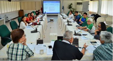 Participants of the program review discuss the accomplishments of the project Characterization of 'Carabao' and other Mango Varieties with Red Blush and Thick Peel, and Development of Hybrids. (Image Credit: Crops Research Division, DOST-PCAARRD)
